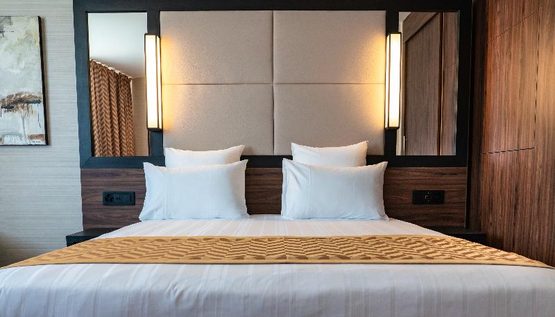 Nash Suites Airport Hotel - Oda