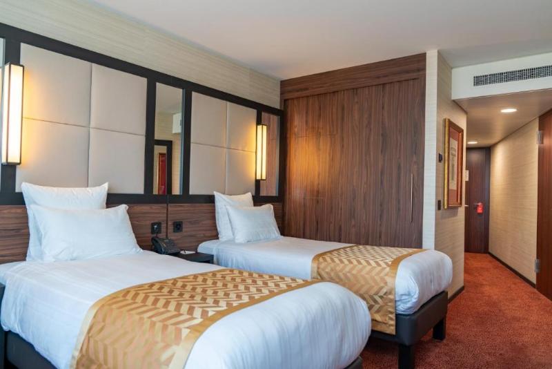 Nash Suites Airport Hotel - Oda