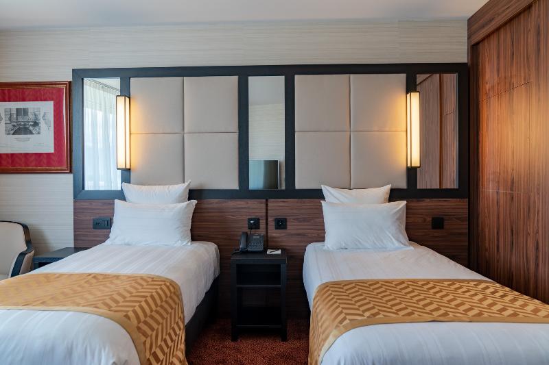 Nash Suites Airport Hotel - Oda