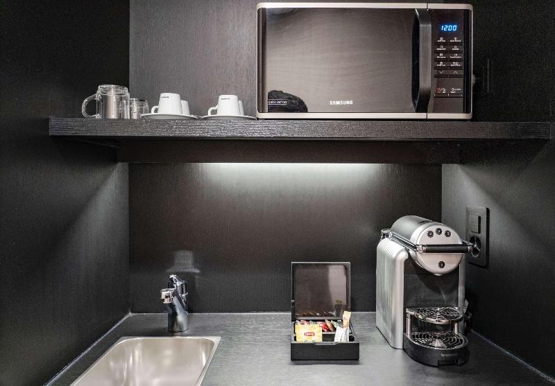 Nash Suites Airport Hotel - Oda