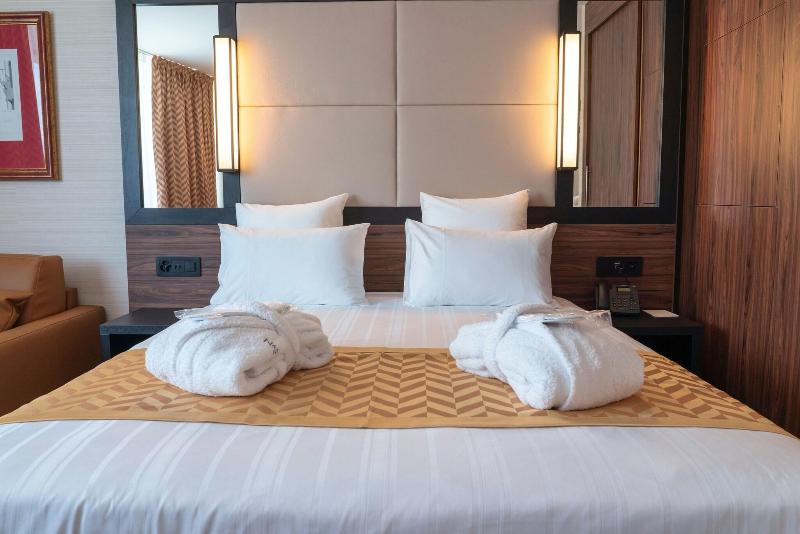 Nash Suites Airport Hotel - Oda