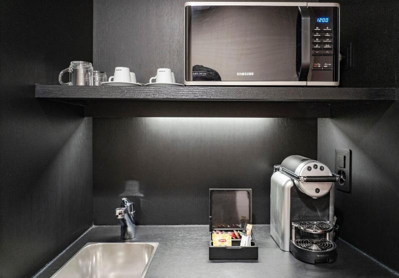 Nash Suites Airport Hotel - Oda
