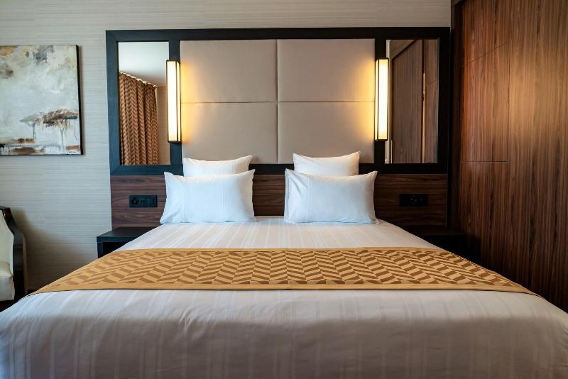Nash Suites Airport Hotel - Oda