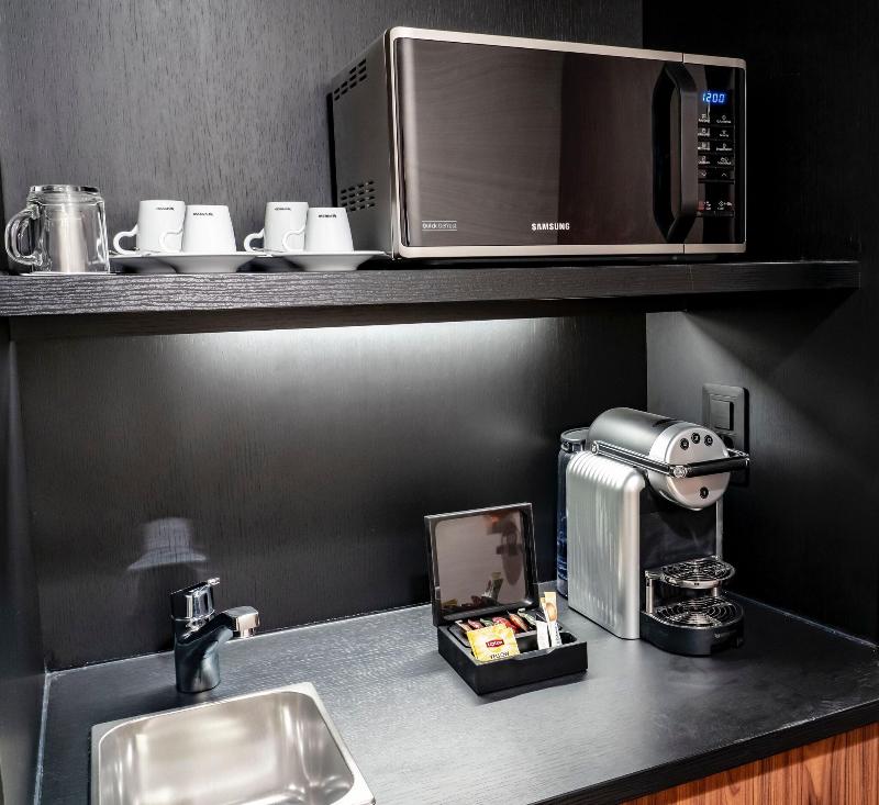Nash Suites Airport Hotel - Oda