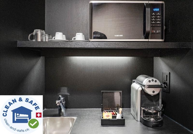 Nash Suites Airport Hotel - Oda