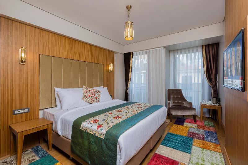 Obelisk Hotel & Suites - Oda