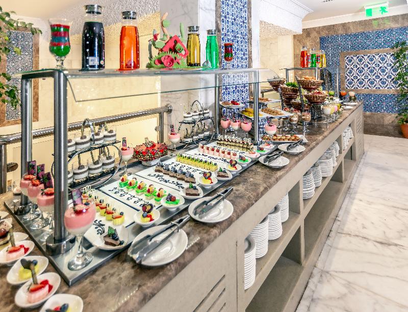 Tulip Inn Al Dar Rawafed - Restoran