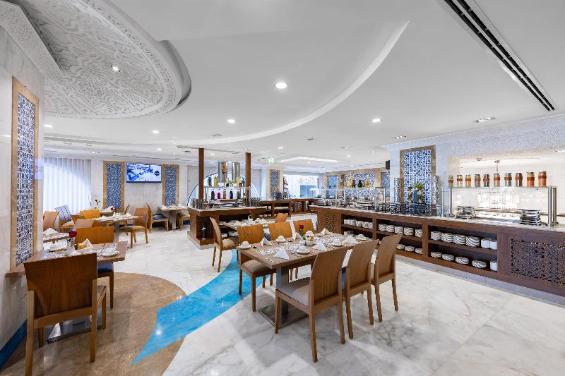 Tulip Inn Al Dar Rawafed - Restoran