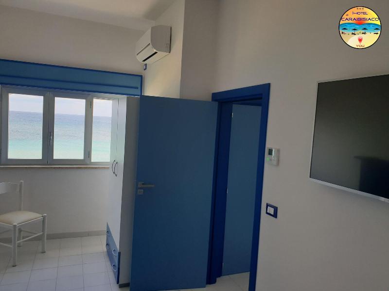 Hotel Caraibisiaco Sul Mare - Oda