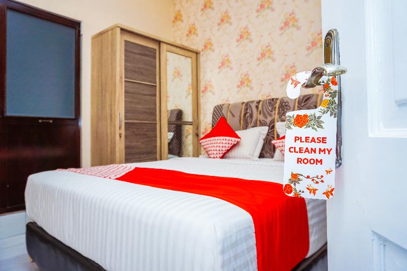 OYO 433 Nelvi Guest House Syariah - Oda