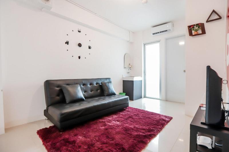 Oyo 129 Bassura City Apartment - Oda