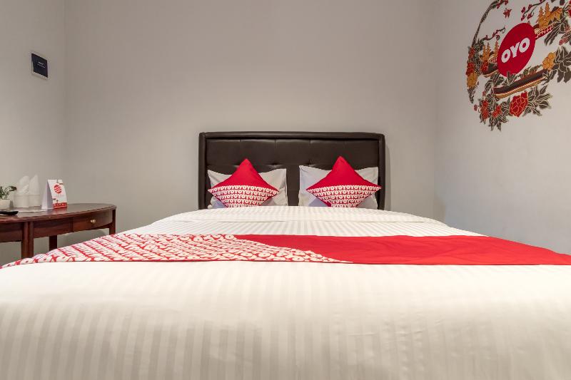 Super OYO 283 Helvetia Residence - Oda