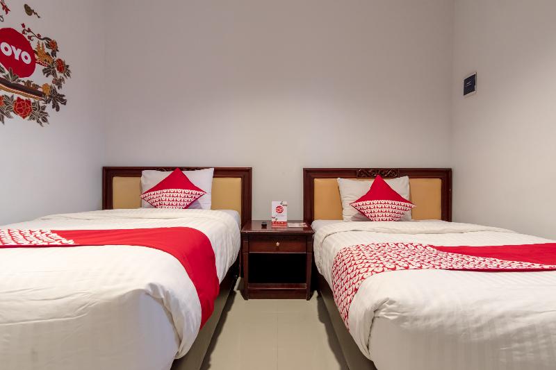 Super OYO 283 Helvetia Residence - Oda