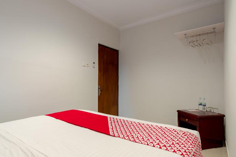 Super OYO 283 Helvetia Residence - Oda