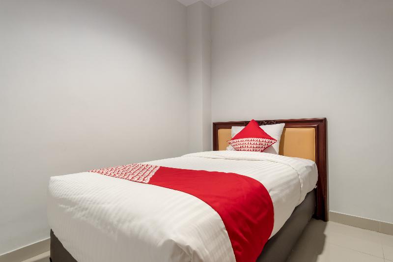 Super OYO 283 Helvetia Residence - Oda