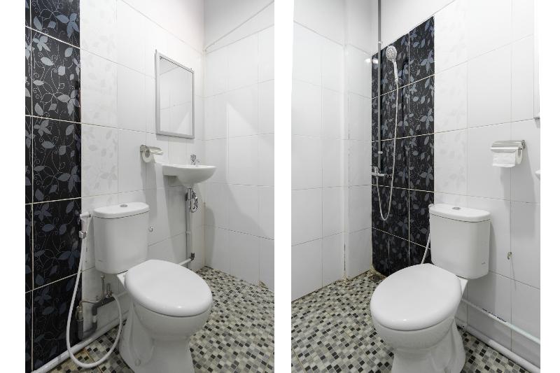 Super OYO 283 Helvetia Residence - Oda