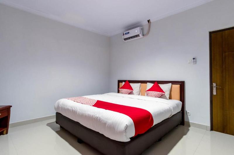 Super OYO 283 Helvetia Residence - Oda