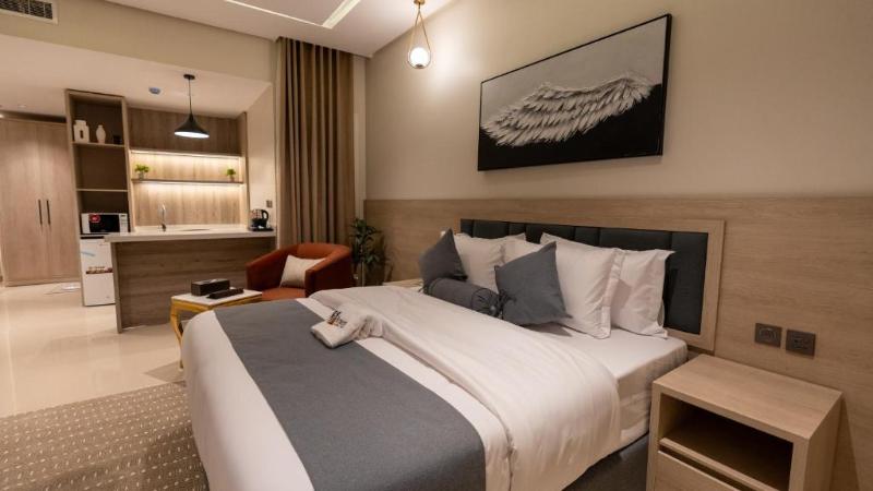 Capital O 162 Brzeen Hotel - Oda