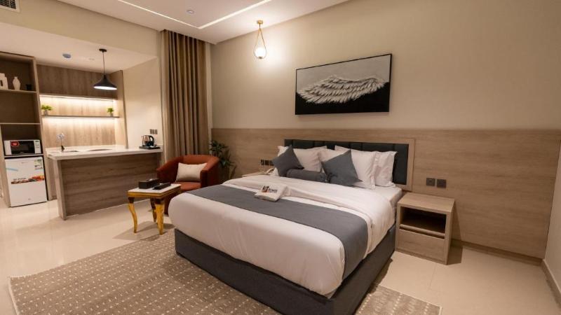 Capital O 162 Brzeen Hotel - Oda