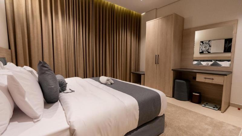 Capital O 162 Brzeen Hotel - Oda