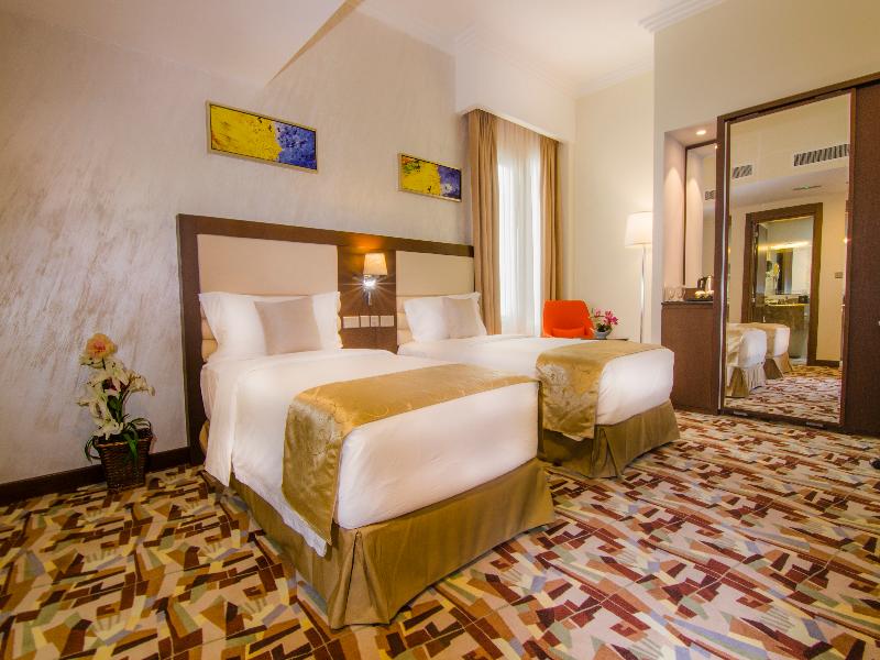Al Murooj Grand Hotel - Oda