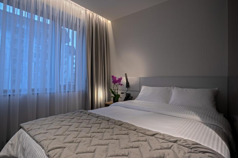 Mona Plaza Hotel - Oda