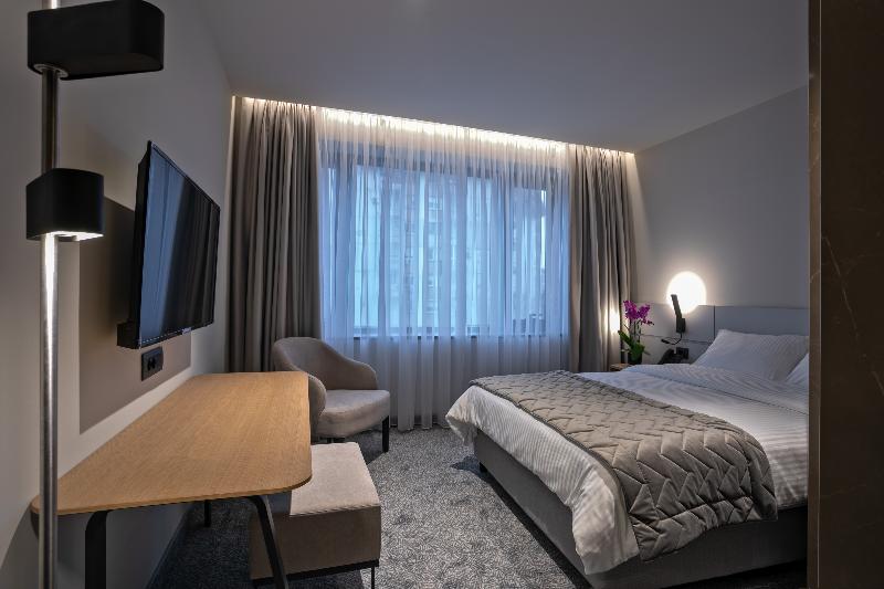 Mona Plaza Hotel - Oda