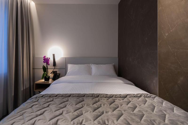 Mona Plaza Hotel - Oda