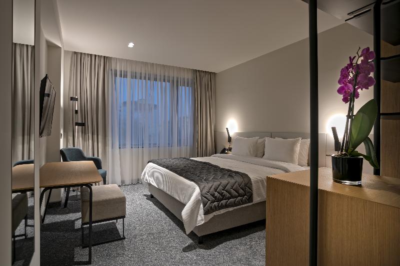 Mona Plaza Hotel - Oda