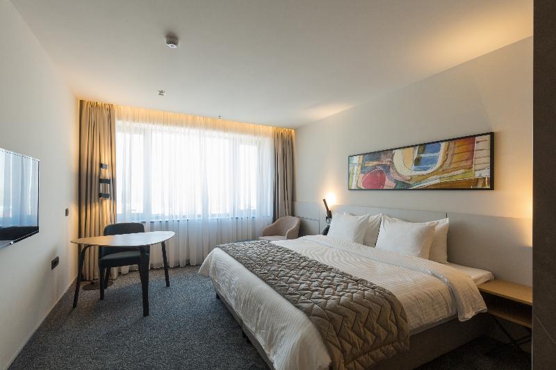 Mona Plaza Hotel - Oda