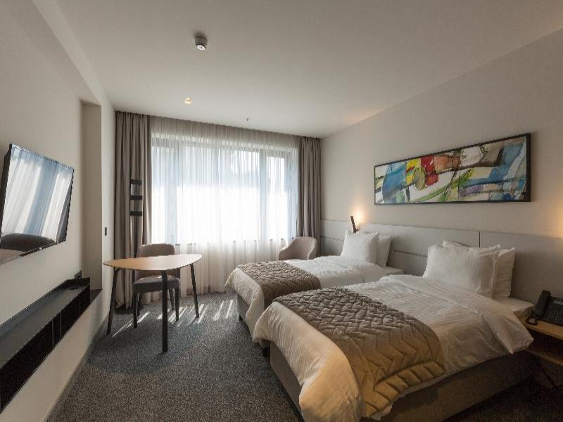 Mona Plaza Hotel - Oda