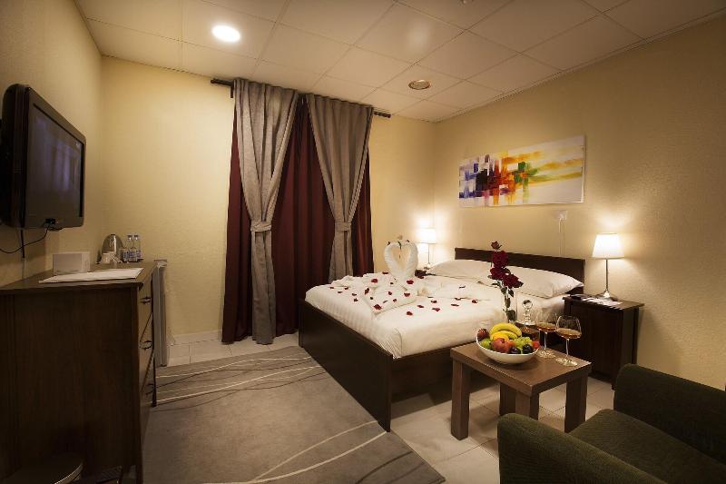 Palms Lily Hotel Suites - Oda