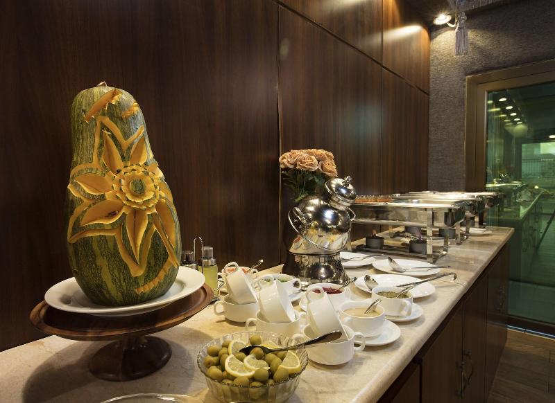 Palms Lily Hotel Suites - Restoran