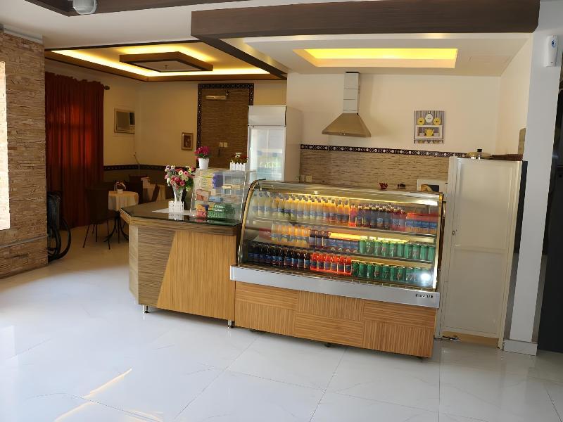 Al Alya Hotel Rooms And Suites - Restoran
