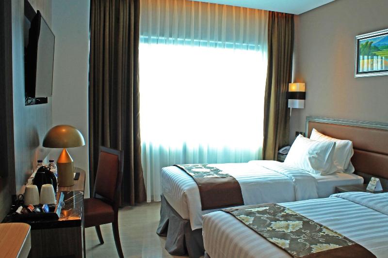 Arthama Hotels Losari Makassar - Oda