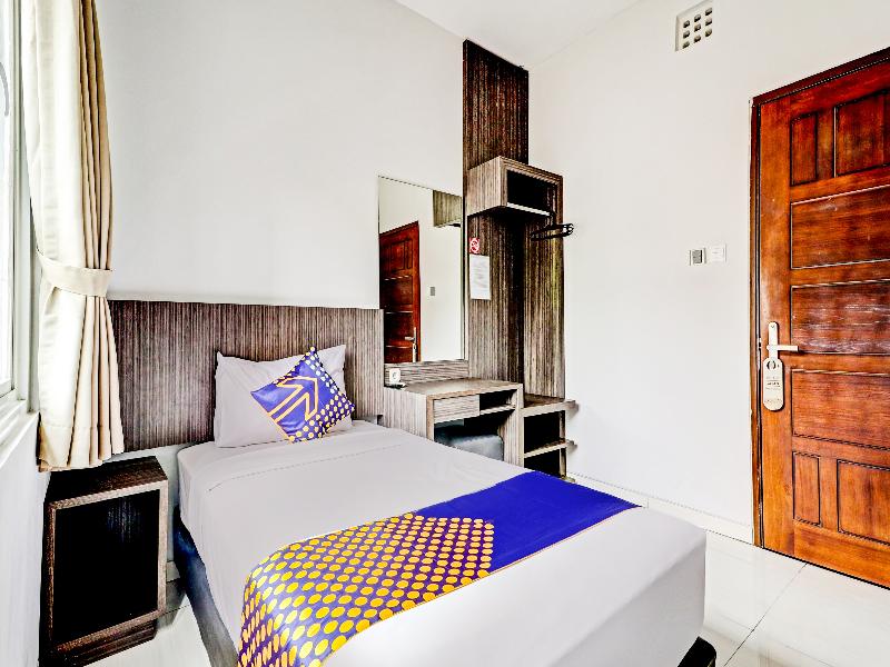 SPOT ON 90777 D’river Guest House - Oda