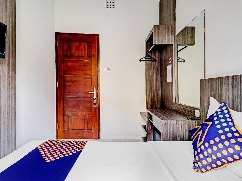SPOT ON 90777 D’river Guest House - Oda