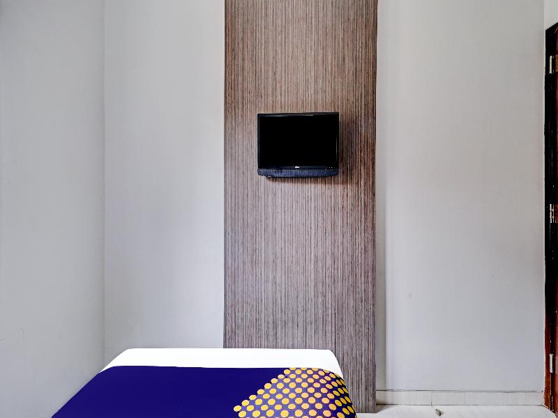 SPOT ON 90777 D’river Guest House - Oda