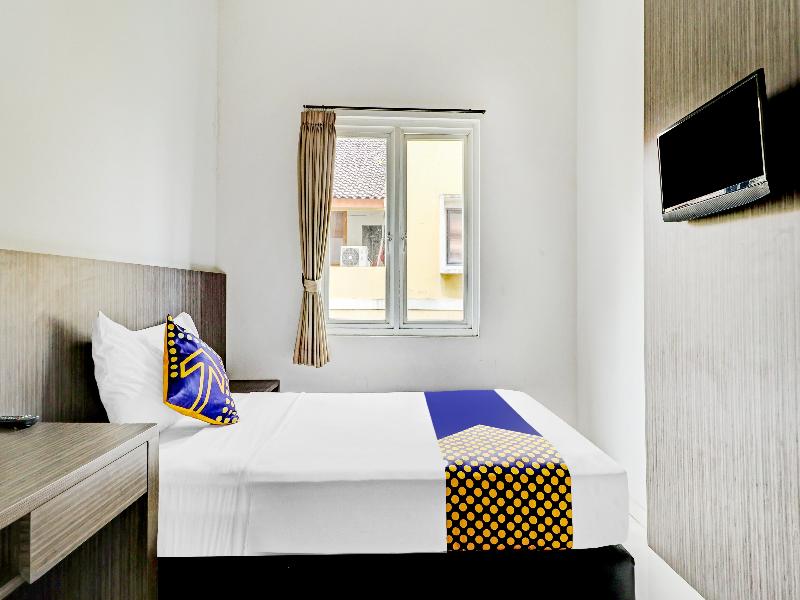 SPOT ON 90777 D’river Guest House - Oda