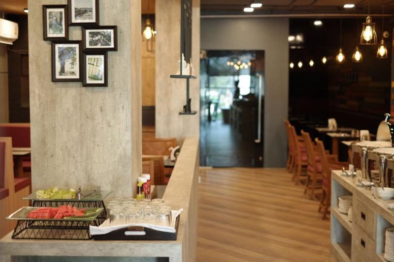 The Sunreno Serviced Apartment - Restoran