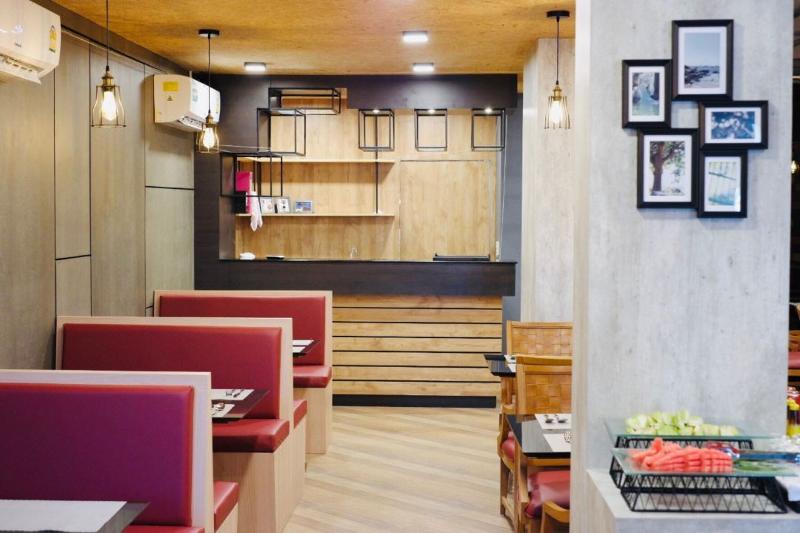 The Sunreno Serviced Apartment - Restoran
