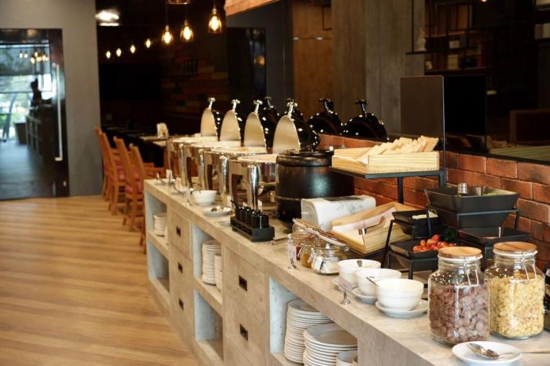 The Sunreno Serviced Apartment - Restoran