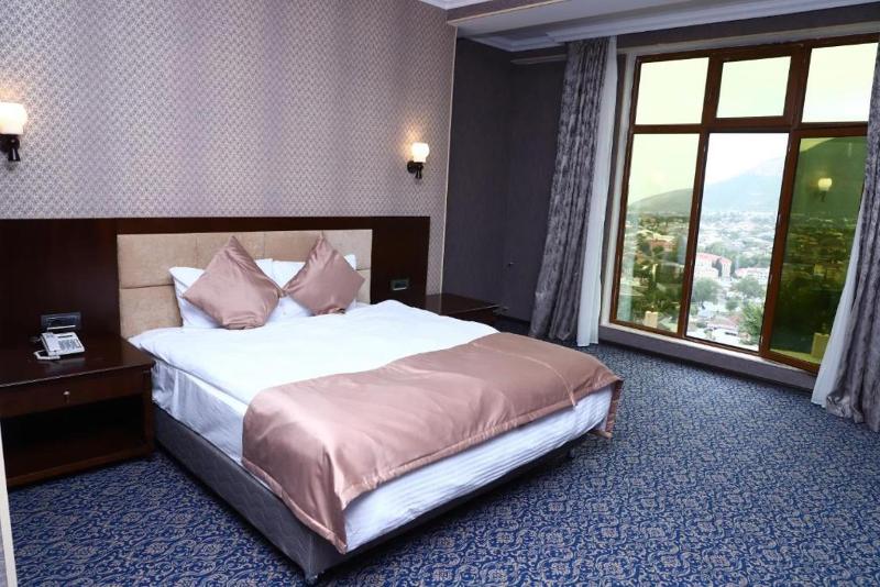 Ruma Qala Hotel - Oda