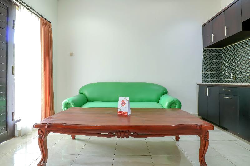 Capital O 1666 Grand Pudjawan Hotel - Oda