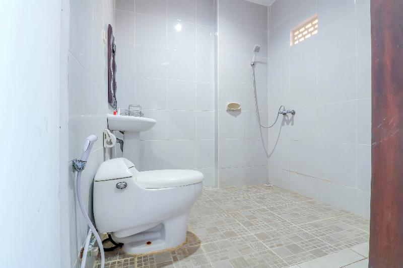 Capital O 1666 Grand Pudjawan Hotel - Oda