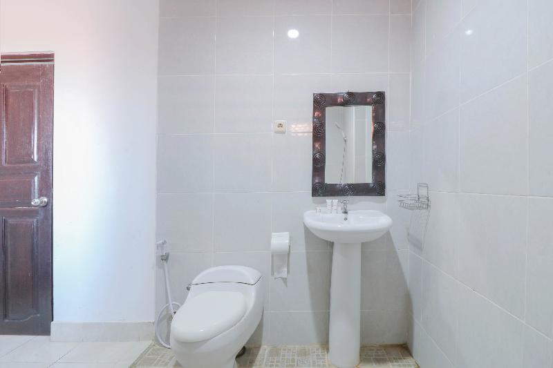 Capital O 1666 Grand Pudjawan Hotel - Oda