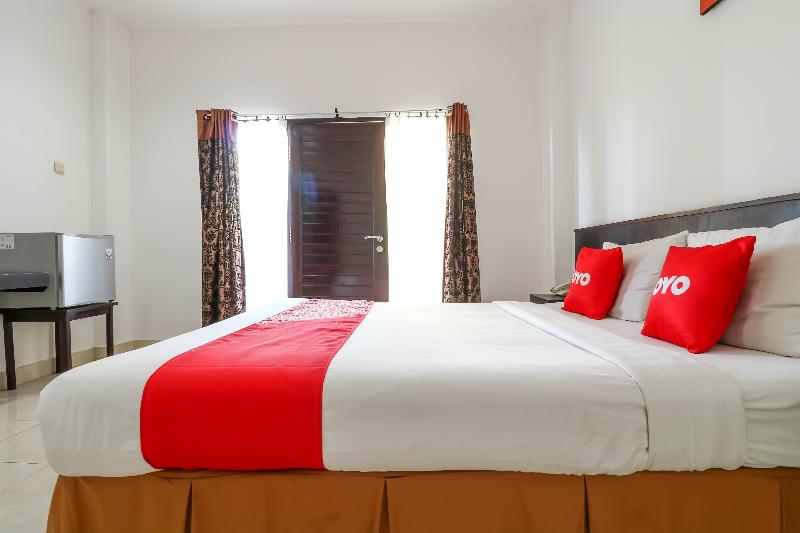 Capital O 1666 Grand Pudjawan Hotel - Oda