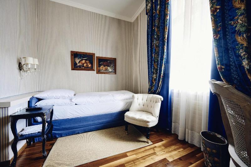 Romantik Hotel Europe - Oda
