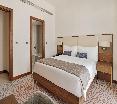 Staybridge Suites Dubai Al-Maktoum Airport oda fotoÄŸrafÄ±
