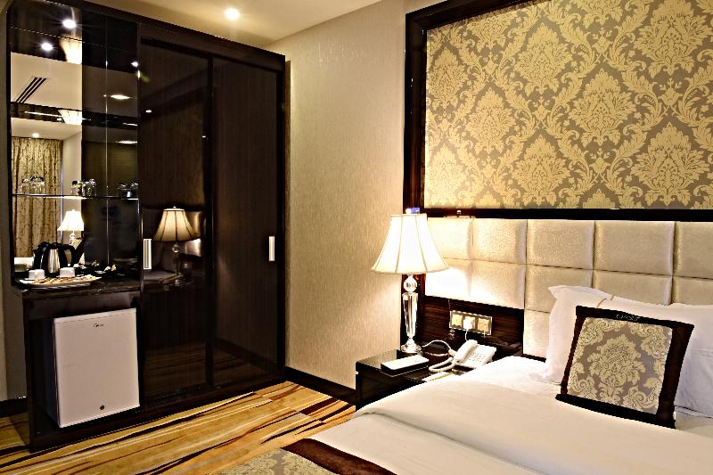 Garden Plaza Hotel - Oda